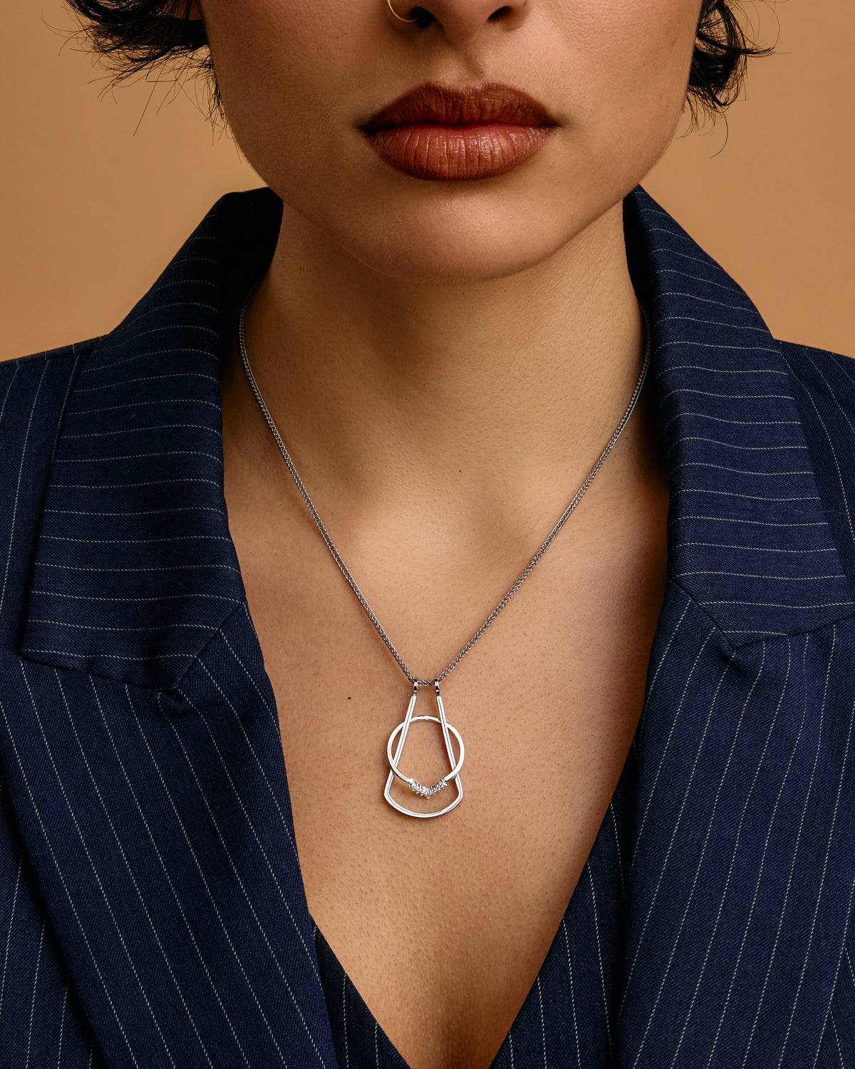 Model top size US 4/UK 8. Wears 45cm (17.7") chain.