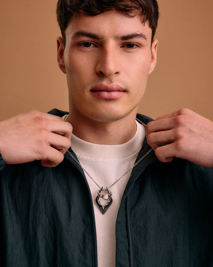 Model top size S. Wears 55cm (21.6") chain.