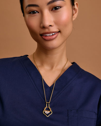 Model US 4/UK 8. Wears 55cm (21.6") chain.